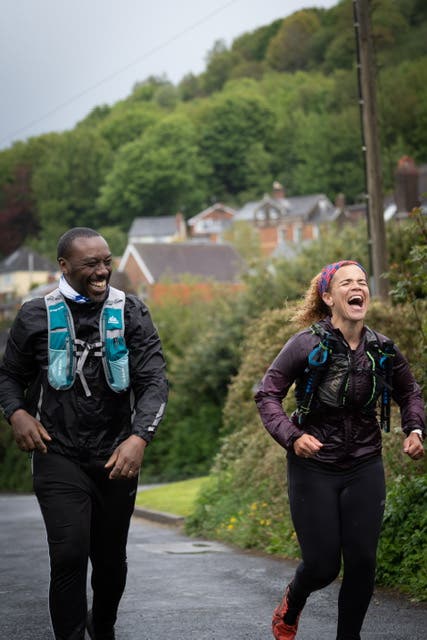 Two runners laughing