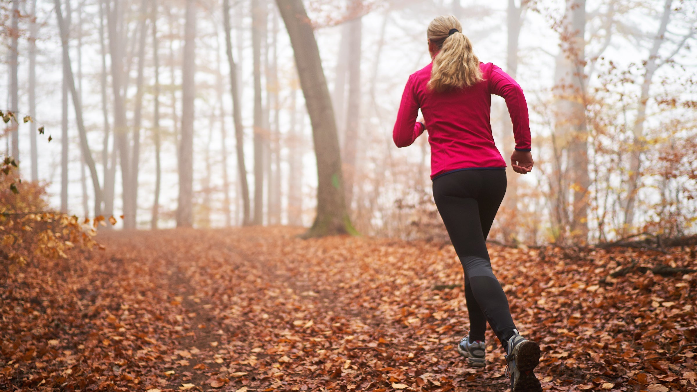 woman running in fall weather