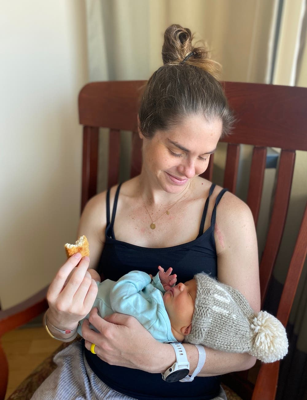 mother with her child and a chicken tender.