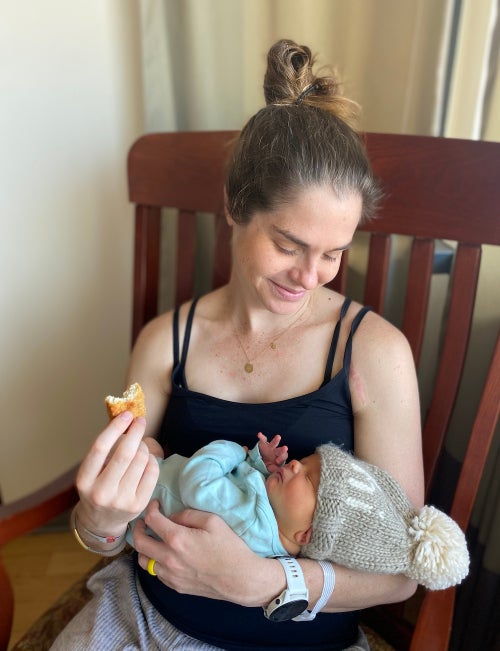 mother with her child and a chicken tender.