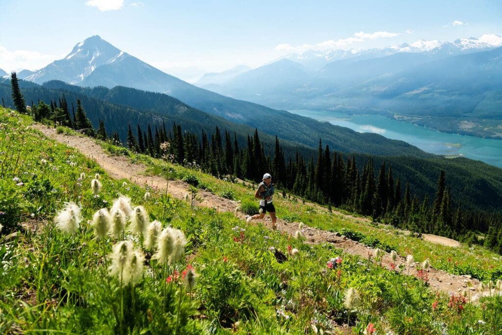 A man runs along a ridge