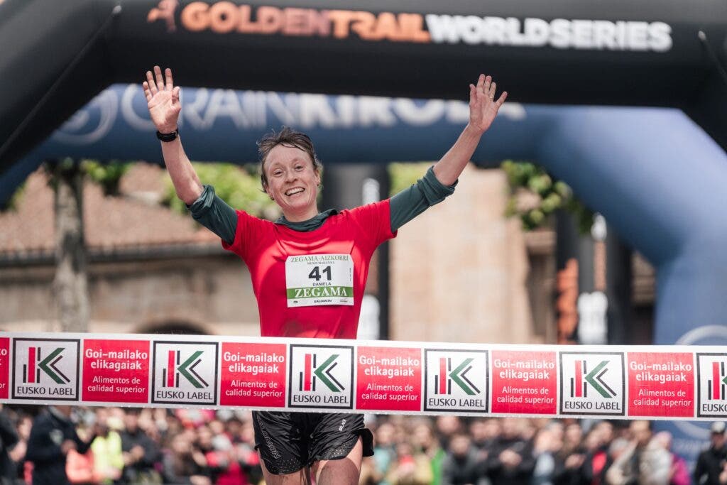 A woman in red wins the race